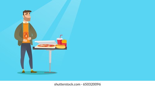 Caucasian man having a stomach ache from heartburn. Young hipster man suffering from a heartburn. Upset man having a stomach ache after fast food. Vector flat design illustration. Horizontal layout.