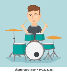 Caucasian mucisian playing on drums. Young mucisian playing on drums. Smiling young man playing on drum kit. Happy man sitting behind the drum kit. Vector flat design illustration. Square layout.