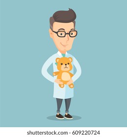 Caucasian pediatrician doctor in medical gown. An adult pediatrician doctor holding a teddy bear. Pediatrician doctor standing with a teddy bear. Vector flat design illustration. Square layout.