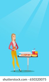 Caucasian sad woman having a stomach ache from heartburn. Young woman suffering from a heartburn. Upset woman having a stomach ache after fast food. Vector flat design illustration. Vertical layout.