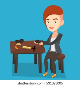 Caucasian shoemaker working with a shoe in workshop. Female shoemaker repairing a shoe in workshop. Young shoemaker making handmade shoes in workshop. Vector flat design illustration. Square layout.