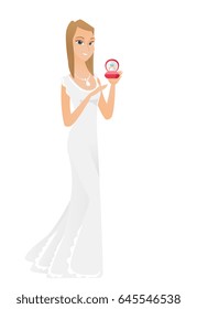 Caucasian smiling bride in a white dress holding red gift box with diamond ring. Full length of young bride holding wedding ring in box. Vector flat design illustration isolated on white background.