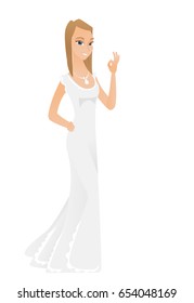 Caucasian smiling fiancee in white dress showing an ok sign. Young happy fiancee making an ok sign. Successful fiancee gesturing ok sign. Vector flat design illustration isolated on white background.