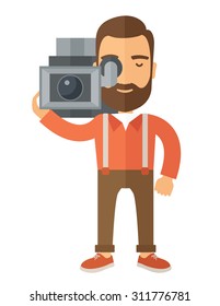 A caucasian videographer with his video camcorder. A Contemporary style. Vector flat design illustration isolated white background. Vertical layout