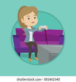 Caucasian woman sitting on a sofa and playing video game on the television. Excited woman with console in hands playing video game. Vector flat design illustration in the circle isolated on background