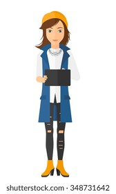 A caucasian young woman standing with tablet computer in hands vector flat design illustration isolated on white background. Vertical layout.