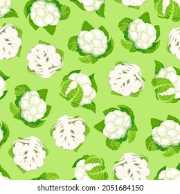 Cauliflower. Seamless pattern with cabbage on a green background. Vector illustration of fresh vegetables in cartoon simple flat style.