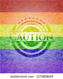 Caution emblem on mosaic background with the colors of the LGBT flag