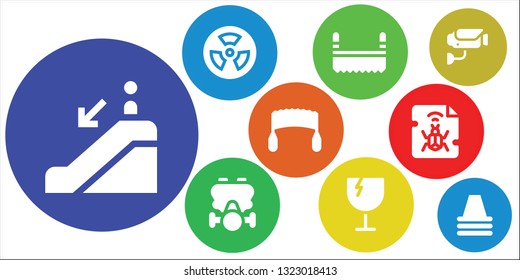 caution icon set. 9 filled caution icons.  Collection Of - Escalator down, Radioactive, Saw, Gas mask, Fragile, Malware, Surveillance, Cone