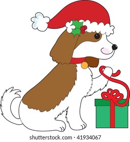 A Cavalier King Charles Spaniel is opening a Christmas present