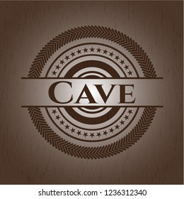 Cave badge with wood background