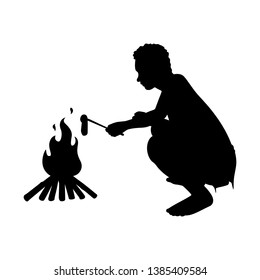 Caveman with bonfire silhouette vector