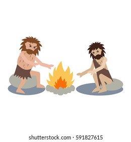 Caveman Cartoon Character. Two Cave Man Warm Themselves In Front Of Camp Fire.