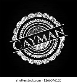 Cayman written on a chalkboard
