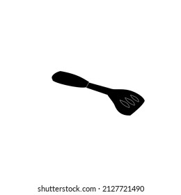  A cblack turner for cooking