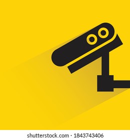 CCTV with shadow on yellow background