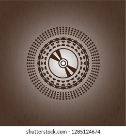 Cd disc icon inside wood emblem. Vintage.