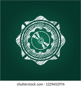 CD or DVD disc icon drawn on a chalkboard