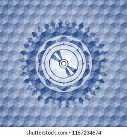 CD or DVD disc icon inside blue polygonal badge.