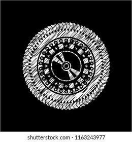 CD or DVD disc icon inside chalk emblem written on a blackboard