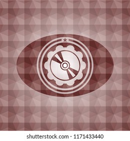 CD or DVD disc icon inside red seamless badge with geometric pattern.