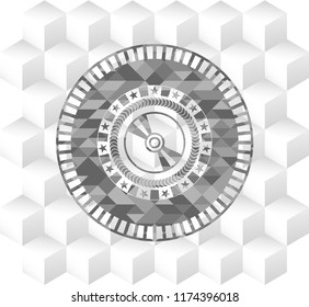 CD or DVD disc icon inside grey badge with geometric cube white background