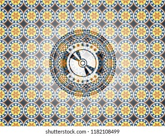  CD or DVD disc icon inside arabic style emblem. Arabesque decoration.