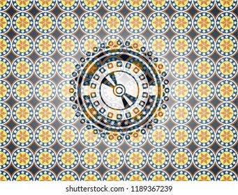CD or DVD disc icon inside arabic style emblem. Arabesque decoration.