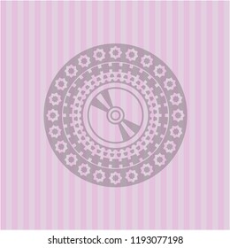 CD or DVD disc icon inside retro style pink emblem