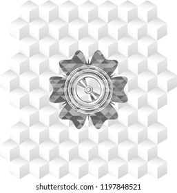 CD or DVD disc icon inside grey emblem with cube white background
