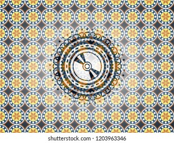 CD or DVD disc icon inside arabic style badge. Arabesque decoration.
