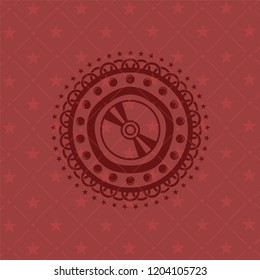 CD or DVD disc icon inside badge with red background