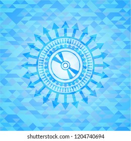 CD or DVD disc icon inside light blue emblem with triangle mosaic background