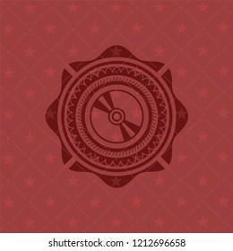 CD or DVD disc icon inside badge with red background