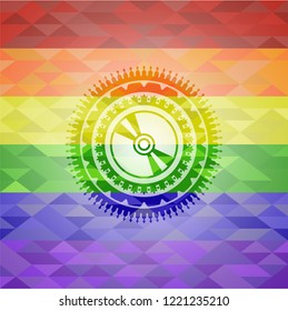 CD or DVD disc icon inside emblem on mosaic background with the colors of the LGBT flag