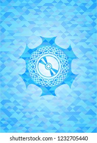 CD or DVD disc icon inside light blue emblem with mosaic background