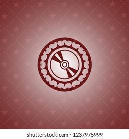 CD or DVD disc icon inside red icon or emblem