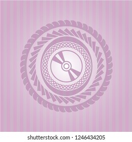 CD or DVD disc icon inside realistic pink emblem