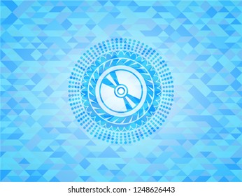 CD or DVD disc icon inside light blue mosaic emblem