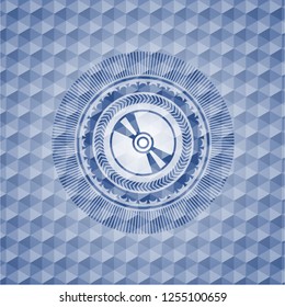 CD or DVD disc icon inside blue emblem with geometric pattern.