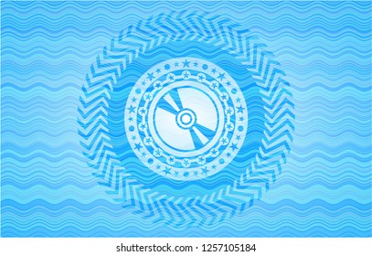 CD or DVD disc icon inside water wave concept style emblem.