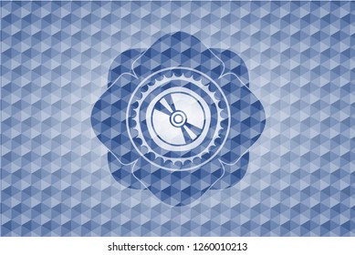 CD or DVD disc icon inside blue emblem or badge with geometric pattern background.