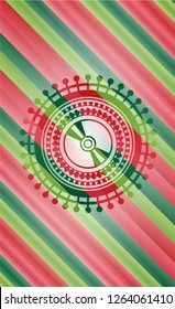 CD or DVD disc icon inside christmas colors badge.