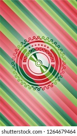 CD or DVD disc icon inside christmas colors style badge.