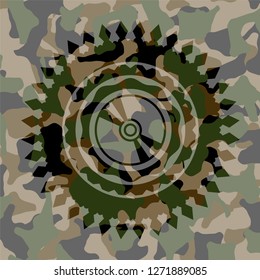 CD or DVD disc icon inside camouflage emblem