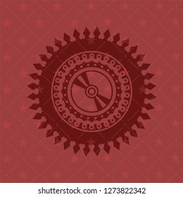 CD or DVD disc icon inside badge with red background