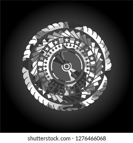 CD or DVD disc icon inside grey camouflage texture