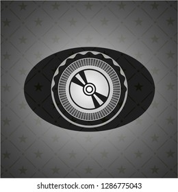 CD or DVD disc icon inside realistic black emblem