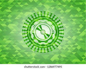 CD or DVD disc icon inside green emblem with triangle mosaic background