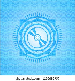 CD or DVD disc icon inside water wave emblem.